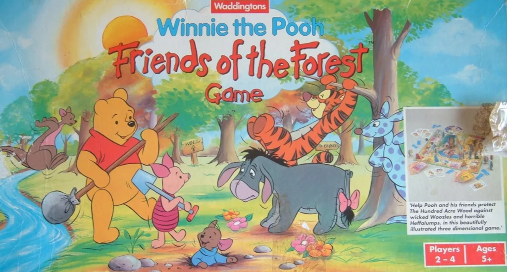 Jeu de société 'Winnie the Pooh Friends of the Forest' montrant Winnie l'Ourson et ses amis explorant une forêt enchantée